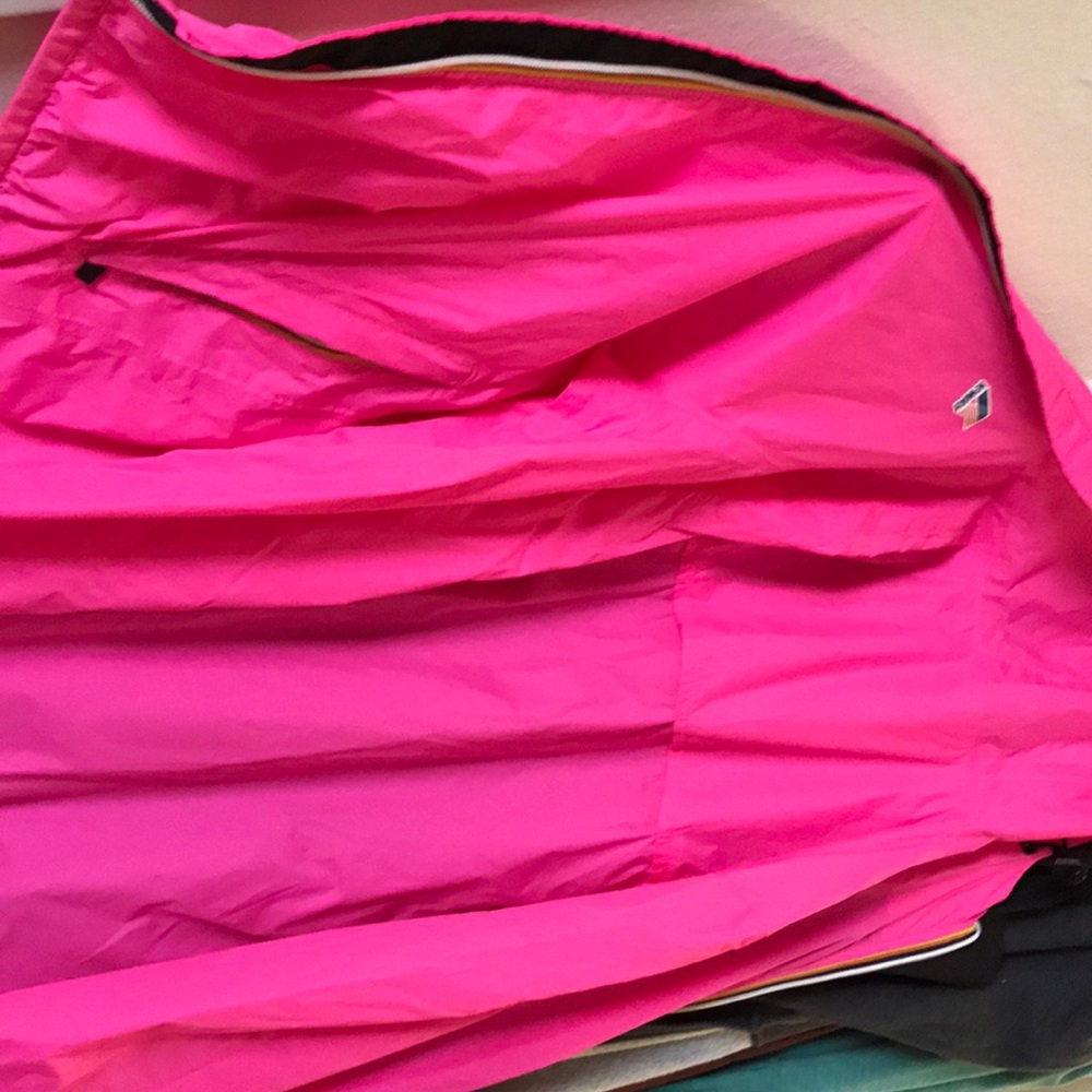 Pink k way wind breaker